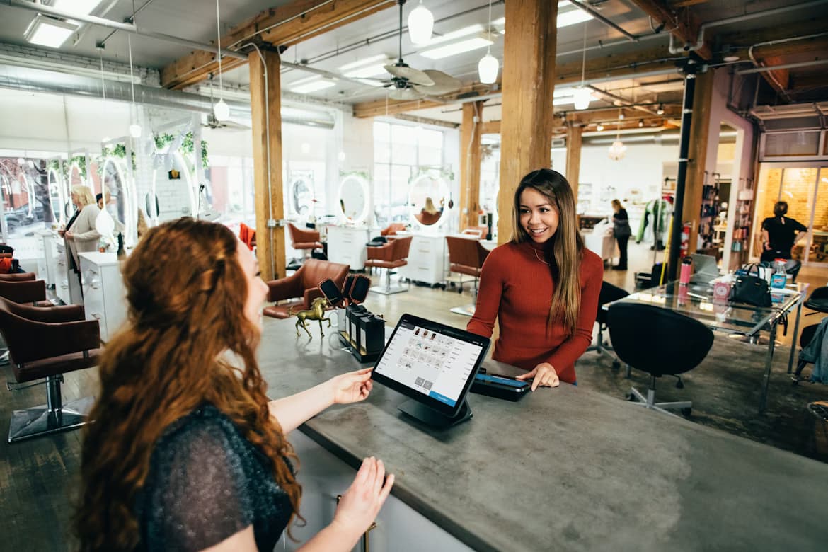 Business owners discussing financing strategy in New England